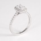 Emerald Diamond Halo Engagement Ring