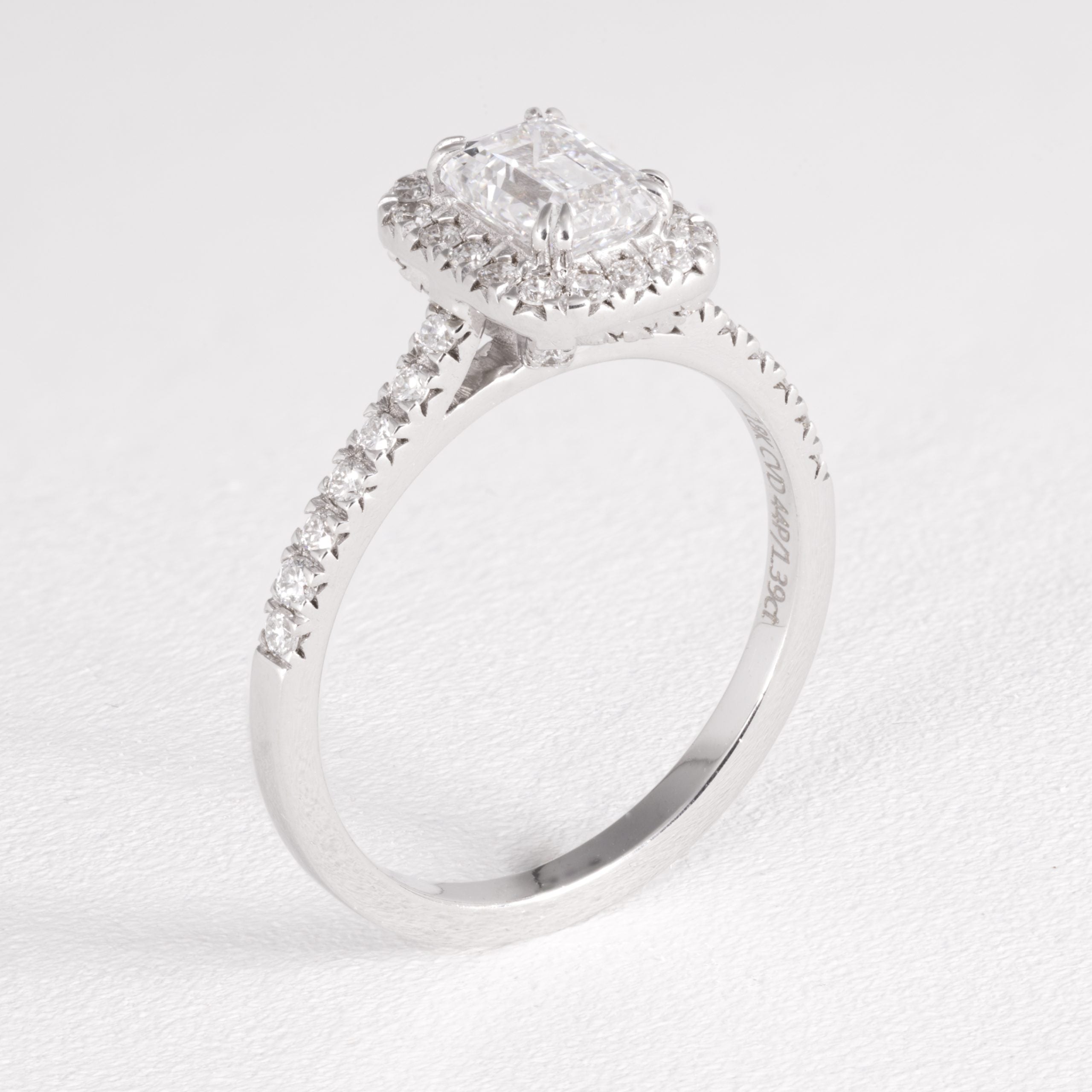 Emerald Diamond Halo Engagement Ring