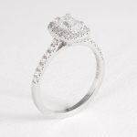 Emerald Diamond Halo Engagement Ring